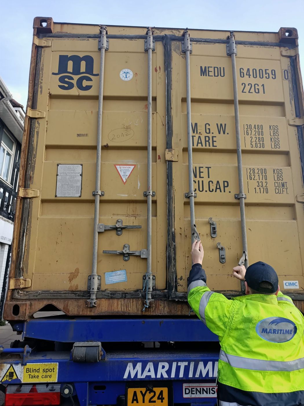 Shipping container being loaded for sea freight