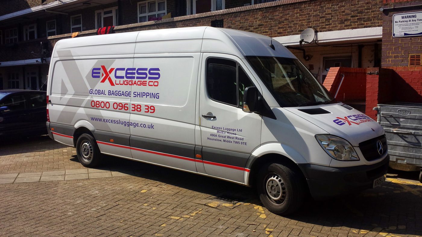 An Excess Luggage van at a customer collection address