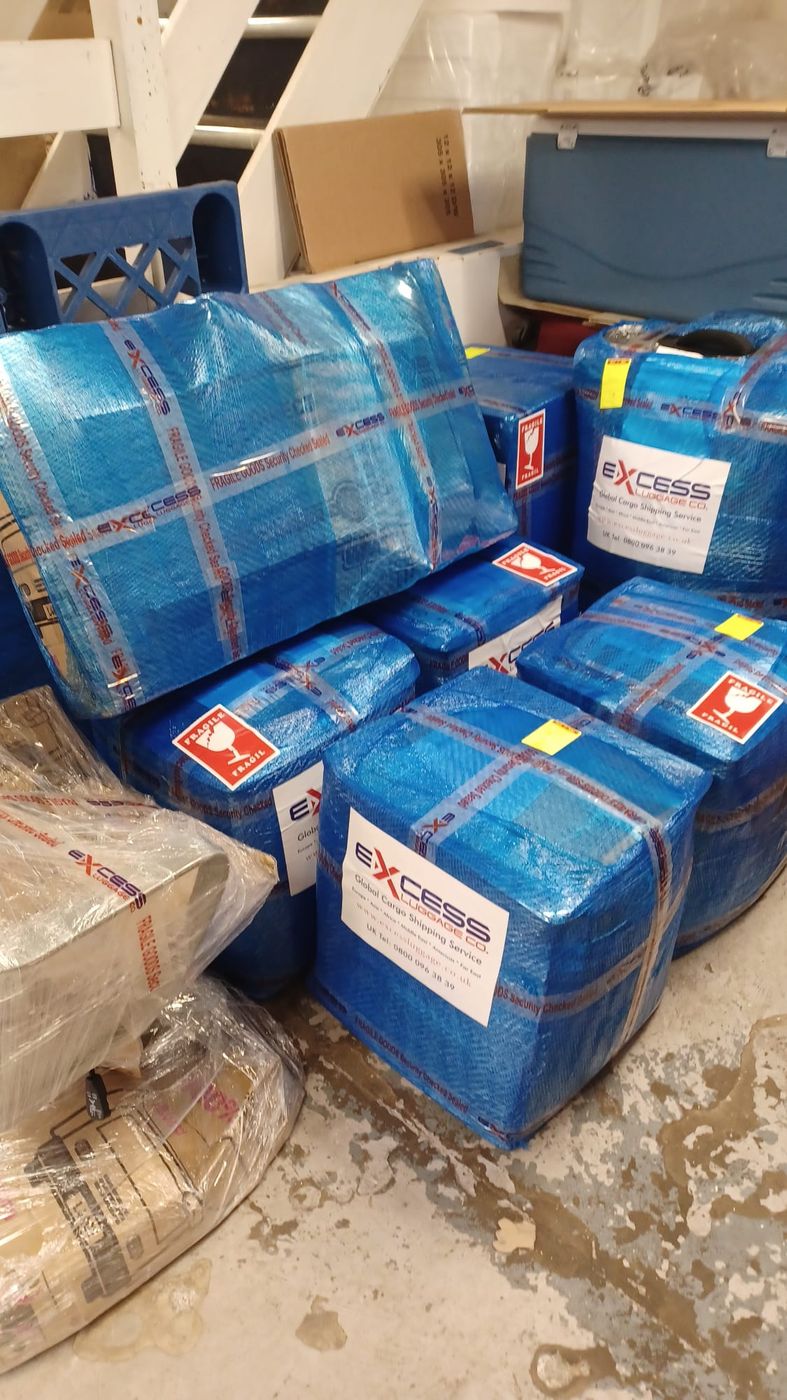 Luggage wrapped and labelled in the warehouse