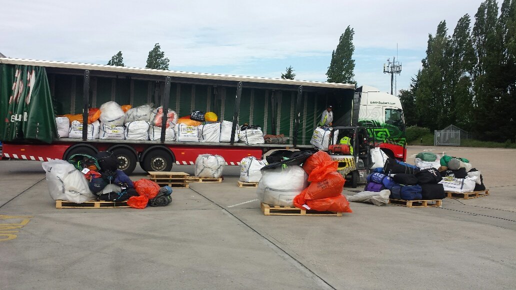 Humanitarian relief cargo on pallets ready for despatch to Nepal — Excess Luggage Co. Heathrow operations 2015
